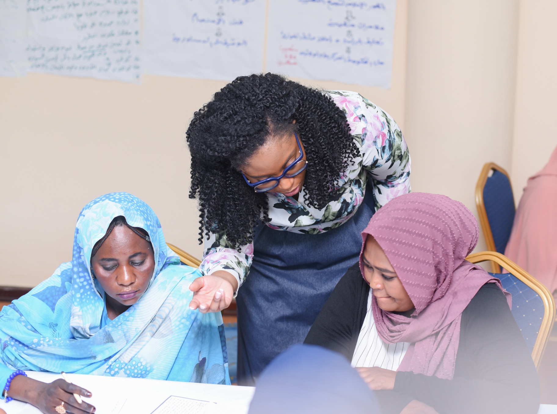 Close working moment with two participants